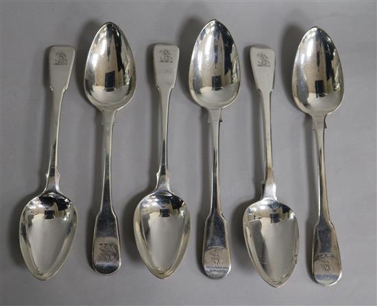 A matched set of six George III silver fiddle pattern table spoons, 14 oz.